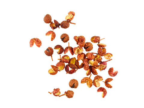 Sichuan Pepper Top View. Also Known as Szechuan Pepper, Szechwan Pepper, Chinese Prickly Ash, Chinese, Rattan, or Mala Pepper. Isolated on White Background.