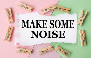 make some noise. text on a colored background. pink and green