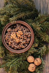 Kutia porridge made from whole grains of wheat, barley, rarely millet or rice with addition of honey or sugar. Traditional Slavic holiday Christmas dish in Ukraine, Belarus and Russia. Selective focus