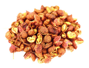 Sichuan Pepper. Also Known as Szechuan Pepper, Szechwan Pepper, Chinese Prickly Ash, Chinese, Rattan, or Mala Pepper. Isolated on White Background.