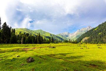 Scenery mountain landscape at Caucasus mountains with clouds.