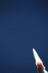 Rocket spaceship. Blue skies. The elements of this image furnished by NASA.