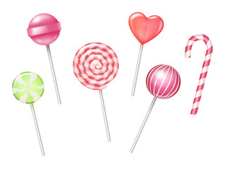 Set of festive colorful lollipops and candy canes on white background