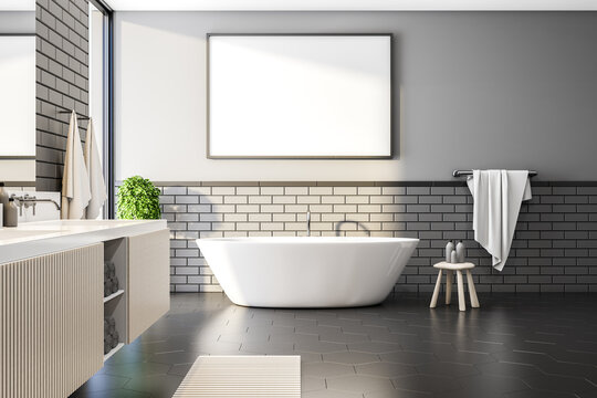 Comfortable bathroom interior with blank banner on wall.