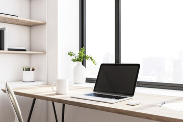 Fototapeta premium Modern home office and laptop with empty black screen