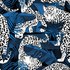 Seamless pattern. Jaguars and a Tropical banana, exotic palm leaves at a dark blue night. Textile composition, hand drawn style print. Vector illustration.