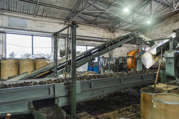 Rubber recycling processing factory on special industrial equipment and conveyor line with cut used...