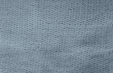Soft cashmere texture, cosy warm cashmere sweater, scarf or blanket texture of gray color. Winter style and mood