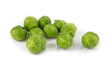 Brussels sprout isolated on white background. Still-life picture of green cabbages taken in studio with soft-box.