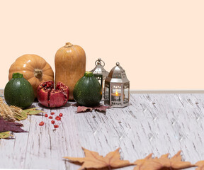 Autumn Pumpkin and pomegranate Background on Wood