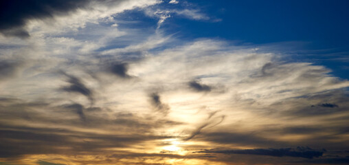 Sky full of clouds of different colors in a sunset