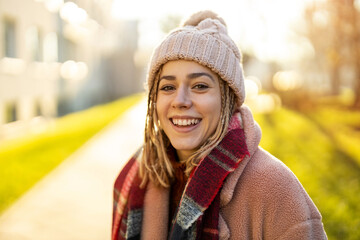 Portrait Of Young Woman Wearing Warm Clothing During Winter

