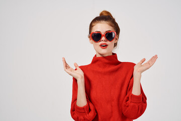 fashion woman in red sweater gesturing with her hands thumb model