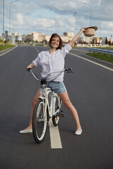 Obraz na płótnie Canvas happy girl biker
