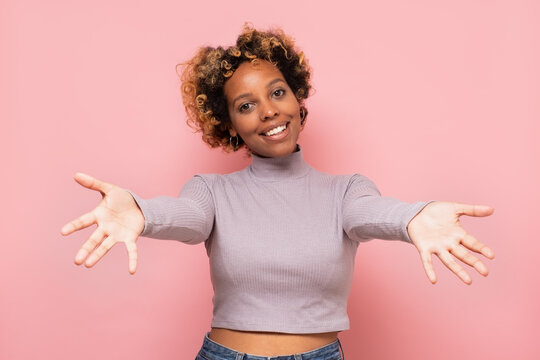 African American Woman Smiling With Open Arms For Hug.