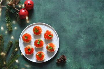 Tartlets with red caviar on the New Year's table.