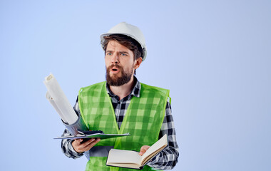 man in working uniform construction drawings job professional