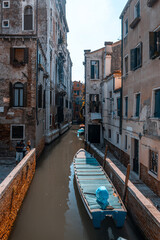 Fototapeta na wymiar Old italian architecture with landmark bridge, romantic boat. Venezia. Grand canal for gondola in travel europe city. Italy, Venice.
