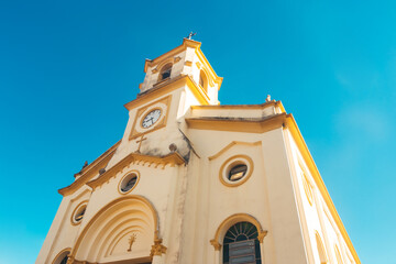 Yellow Cathedral with Blue Sky - Catholic ReIigious Monument - Igreja Matriz de Monte Mor, State of São Paulo, Brazil © Gabriel Borghi