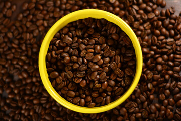 Roasted coffee beans on a wooden table