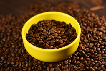 Roasted coffee beans on a wooden table