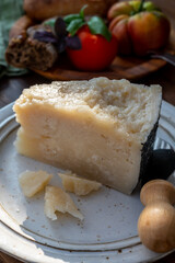 Cheese collection, aged hard Italian sheep cheese black pecorino from Sicily island or pecorino nero di Sicilia.