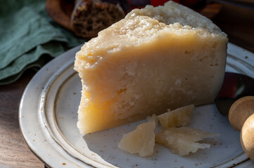 Cheese collection, aged hard Italian sheep cheese black pecorino from Sicily island or pecorino nero di Sicilia.