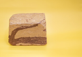 Very Sweet Halva on yellow background with copy space