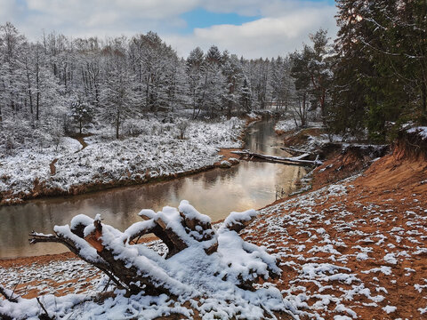 Beautiful winter landscape of forest river Isloch, Minsk region, Belarus. High quality photo by phone.