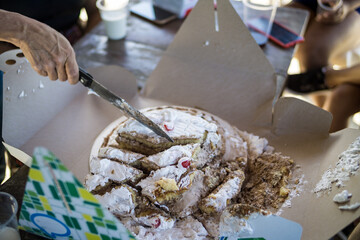 destroyed birthday cake with knife
