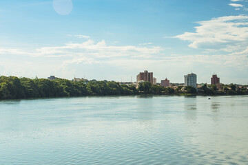 Fototapeta premium Paranaíba River at the Border of Goiás and Minas Gerais with Itumbiara City in the Background