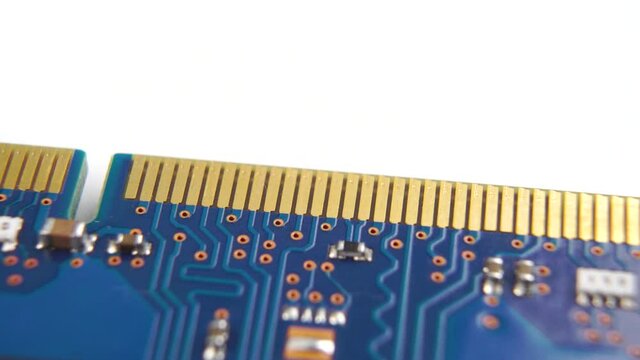 Golden contacts of the RAM memory module of a computer, laptop. Macro. Dolly Shot