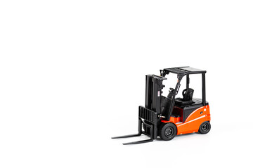 Red toy forklift loader isolated on white background. Copy Space for text. moving service and distribution products. Delivery production. Logistics and industrial concept.