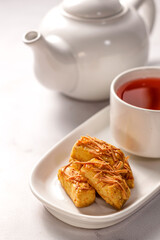 cup of tea and croissants