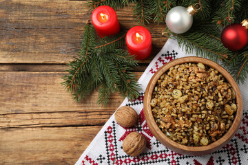 Traditional Christmas slavic dish kutia served on wooden table, flat lay