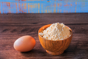 Crispy flour and egg  in wooden bowl.