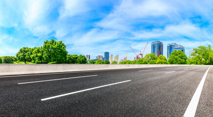 Fototapeta premium Empty asphalt road and Shanghai skyline with buildings scenery.