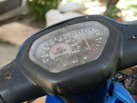 closeup of old motorcycle dashboard or mileage speedometer.