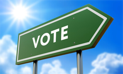 Obraz premium Vote Green Road Sign Against Clouds and Sunburst.