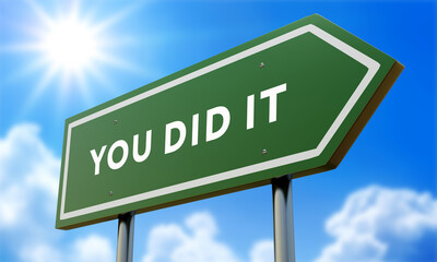 You Did It Green Road Sign Against Clouds and Sunburst.