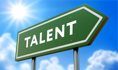 Obraz premium Talent Green Road Sign Against Clouds and Sunburst.