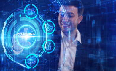 Business, Technology, Internet and network concept. Young businessman working on a virtual screen of the future and sees the inscription: Coaching