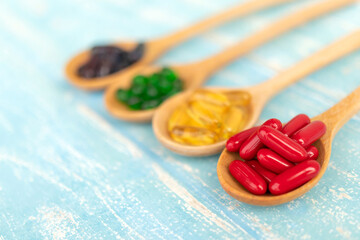 Close-up of supplements on a blue background