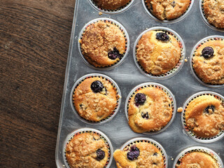 Top view blueberry muffin in baking tray