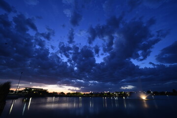 Fototapeta na wymiar Stunning blue sunset over a lake