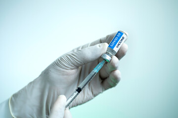 Selective focus, The COVID-19 vaccine is ready for use. Close up syringe and COVID-19...