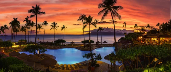 Acrylic prints Beach sunset Tropical resort with sunset near beach