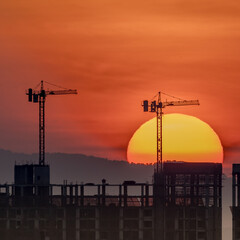 Sunrise  behind the crane
