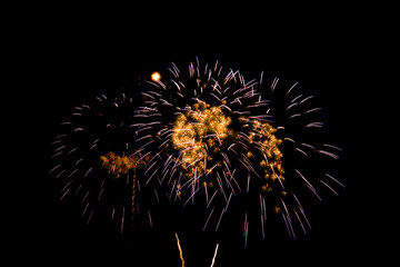Obraz premium Colorful Fireworks Celebration, New Year Celebration Fireworks And The Black Sky Background.