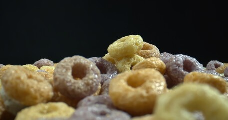 Perfect Fluffy Colorful Cereal. Children food concept. Close up shot of healthy multicolored cereal. Tasty breakfast.